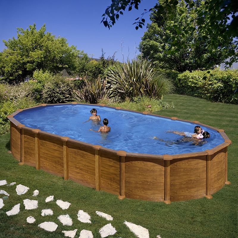 Ensemble de piscine hors sol en bois Gre rectangulaire 620x420x136 cm avec  groupe de filtration à sable, skimmer, échelle, sable de filtration,  intissé de protection du sol & local technique bois 