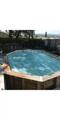 Bâche à bulles luxe SolGuard pour piscine bois Sunbay Gre octogonale allongée