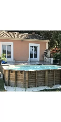 Bâche à bulles luxe SolGuard pour piscine bois Sunbay Gre octogonale allongée
