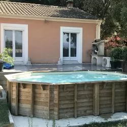 Bâche à bulles luxe SolGuard pour piscine bois Sunbay Gre octogonale allongée