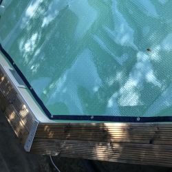 Bâche à bulles luxe SolGuard pour piscine bois Sunbay Gre octogonale allongée