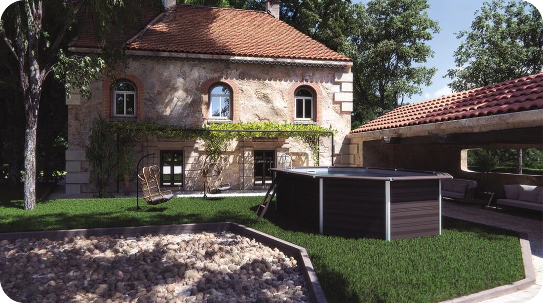 Piscine bois composite Avant Garde Gre 6,64 x 3,86 xh1,24 m dans un jardin